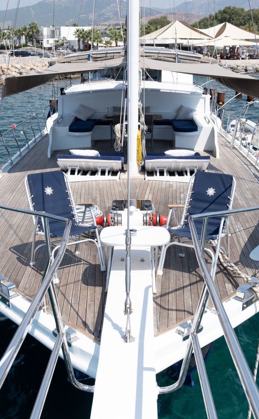 AURA SEA bow over turquoise water, seen from the mast